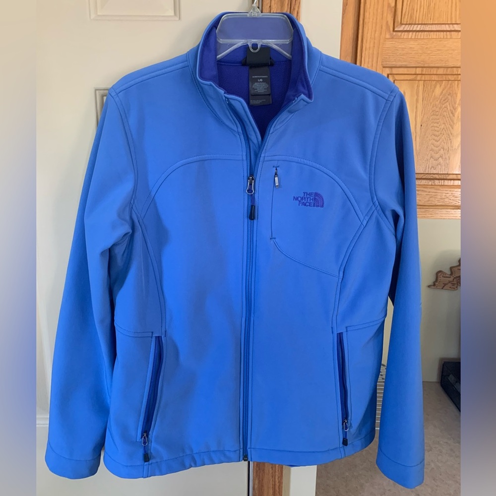 North face Woman’s coat. Blue. Size large. Perfect